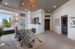 This inviting living space features a cozy fireplace with decorative tile surround, perfect for gathering.