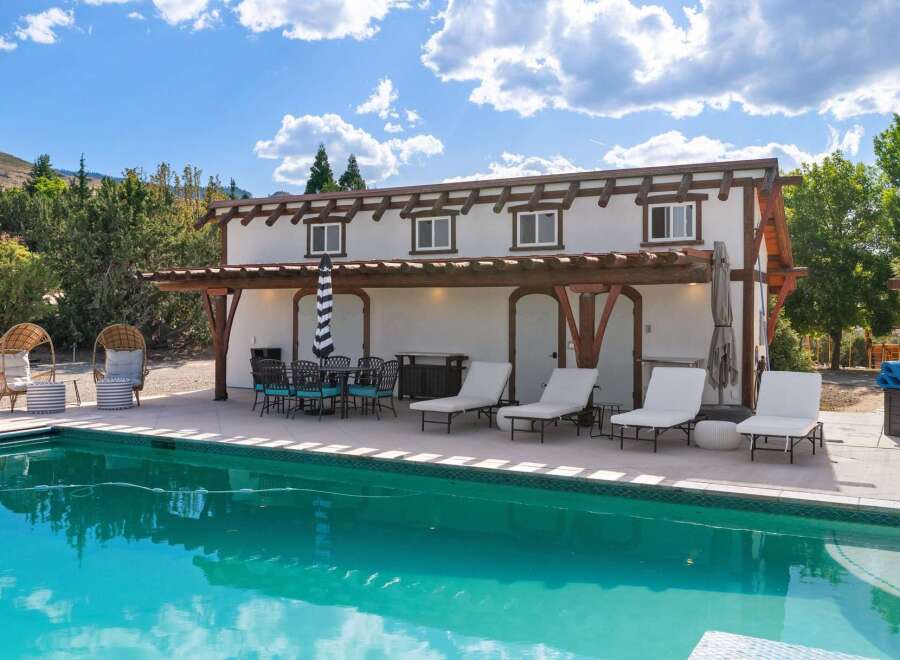 Enjoy ultimate relaxation by this stunning swimming pool, perfect for sunny days and evening dips.