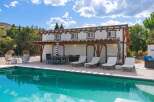 Enjoy ultimate relaxation by this stunning swimming pool, perfect for sunny days and evening dips.