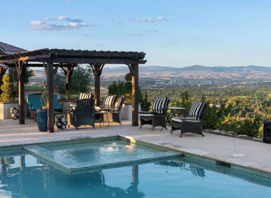 Enjoy breathtaking panoramic views from this stunning property, featuring a luxurious pool and spa area perfect for relaxation and entertainment.