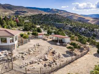 Discover this stunning property nestled in a picturesque mountain landscape, offering a unique blend of luxury and rural charm.