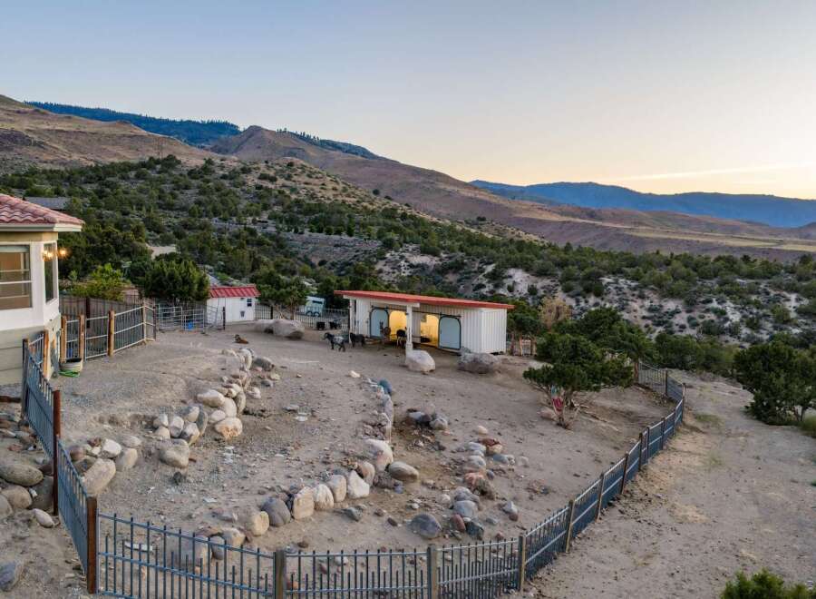 Discover this unique property nestled in a serene, hilly landscape, perfect for animal lovers.