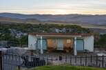 Experience serene country living with this unique property featuring a converted shipping container barn.