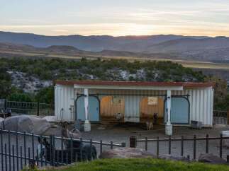 Experience serene country living with this unique property featuring a converted shipping container barn.
