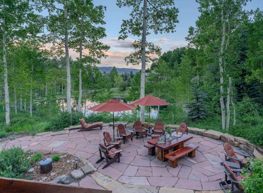 Enjoy breathtaking mountain views from this stunning outdoor patio, perfect for entertaining or relaxing.