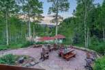 Enjoy breathtaking mountain views from this stunning outdoor patio, perfect for entertaining or relaxing.