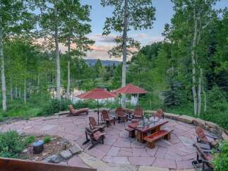 Enjoy breathtaking mountain views from this stunning outdoor patio, perfect for entertaining or relaxing.