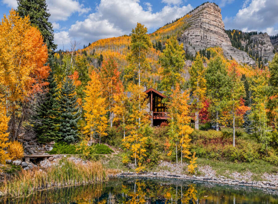 Experience the breathtaking beauty of autumn from this stunning mountain retreat.