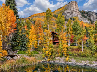 Experience the breathtaking beauty of autumn from this stunning mountain retreat.