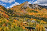 Experience the breathtaking beauty of autumn in this stunning mountain estate.