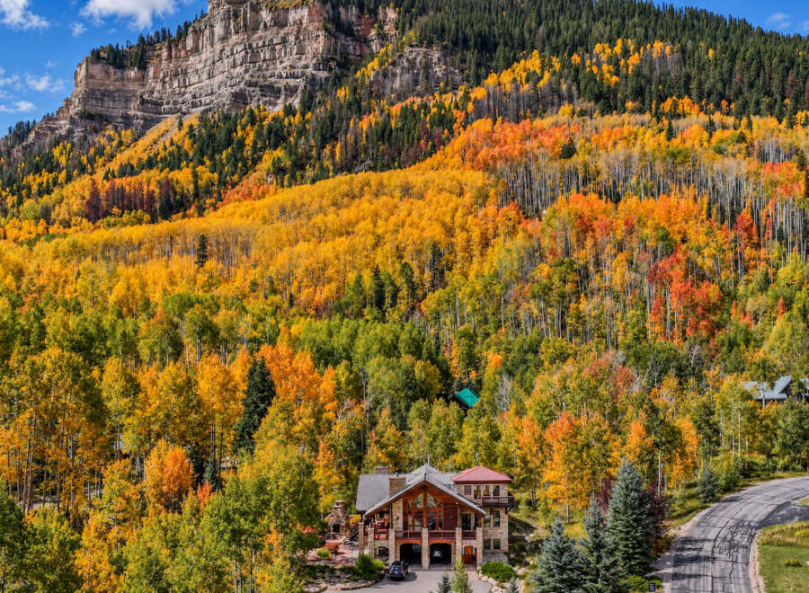 Experience the breathtaking beauty of autumn from this stunning mountain home.