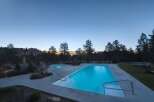 Experience luxury living with this stunning property featuring a pristine swimming pool and a relaxing hot tub, perfect for unwinding.