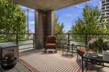Enjoy your morning coffee or evening drinks on this spacious balcony, perfect for outdoor living.