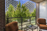 Enjoy your morning coffee or evening relaxation on this charming balcony, complete with comfortable seating and a small table.