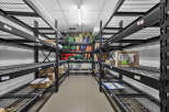 Discover efficient storage solutions with this well-organized shelving unit, perfect for maximizing space in commercial or residential settings.