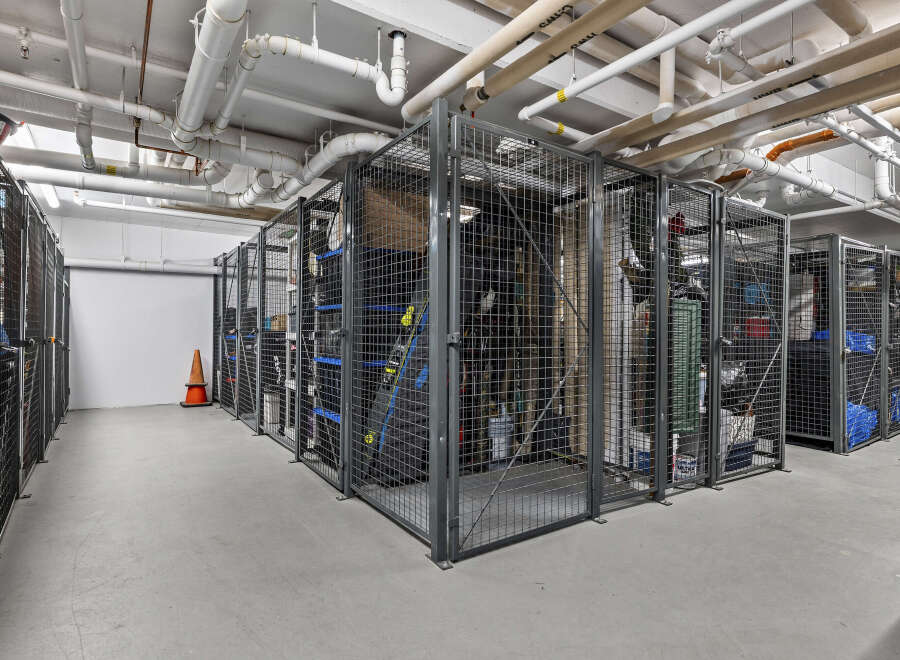 Secure your belongings in these spacious, caged storage units, perfect for residents needing extra space.