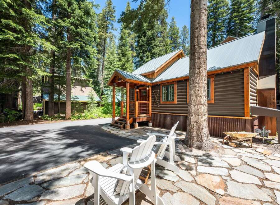 Experience rustic charm in this cozy cabin nestled amongst tall pine trees.