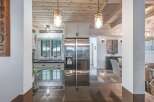 Experience the perfect blend of rustic charm and modern convenience in this stunning kitchen and dining area.