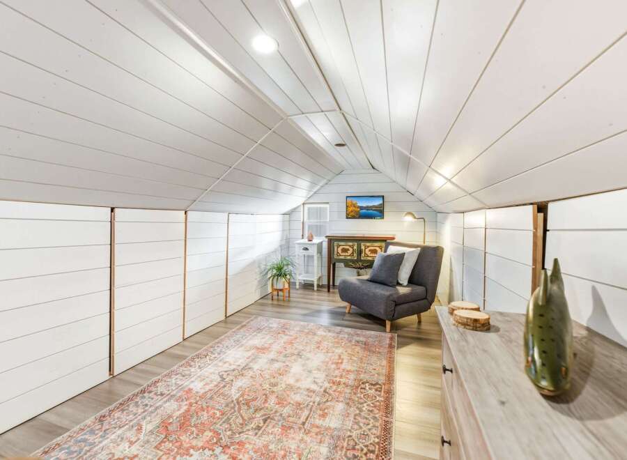 Discover this charming attic space, perfect for a cozy retreat or extra living area.