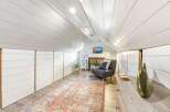 Discover this charming attic space, perfect for a cozy retreat or extra living area.