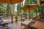 Enjoy the serene mountain setting from this spacious deck, perfect for outdoor living and entertaining.