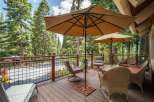 Enjoy the serene mountain views from this spacious deck, perfect for outdoor entertaining or quiet relaxation.