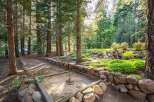 Enjoy outdoor recreation with a dedicated horseshoe pit nestled amongst mature pine trees.