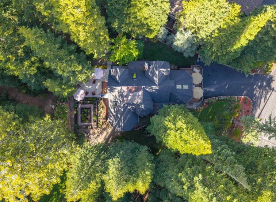 Discover this stunning property nestled amongst lush greenery, offering a private oasis with a beautifully landscaped garden and expansive decking perfect for outdoor entertaining.