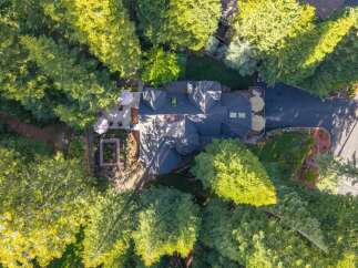 Discover this stunning property nestled amongst lush greenery, offering a private oasis with a beautifully landscaped garden and expansive decking perfect for outdoor entertaining.
