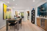 Experience modern living in this open-concept dining and kitchen area, perfect for entertaining.