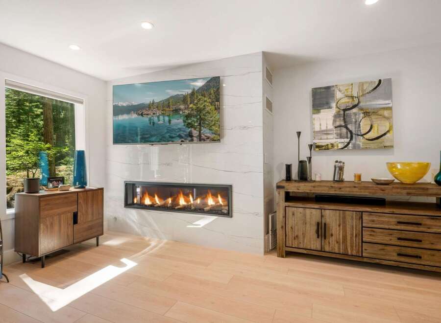 Experience modern living with this stunning fireplace and entertainment center.