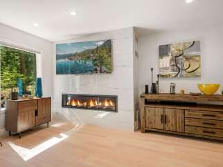 Experience modern living with this stunning fireplace and entertainment center.