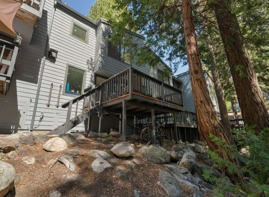 Nestled amongst mature trees, this multi-level home offers a unique mountain retreat.