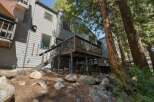 Nestled amongst mature trees, this multi-level home offers a unique mountain retreat.