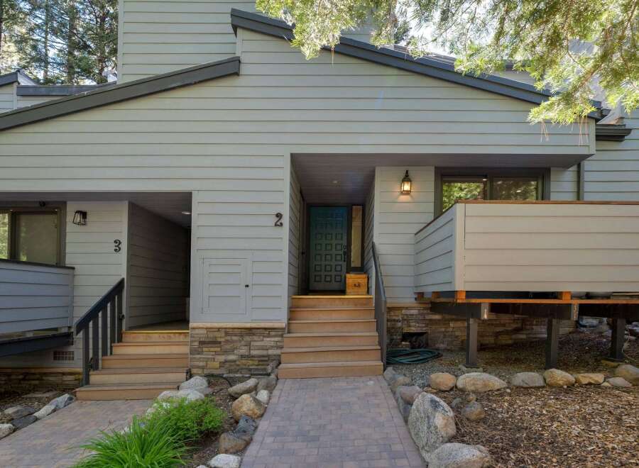 Discover this charming multi-unit property featuring distinct entrances for units 2 and 3.