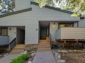 Discover this charming multi-unit property featuring distinct entrances for units 2 and 3.