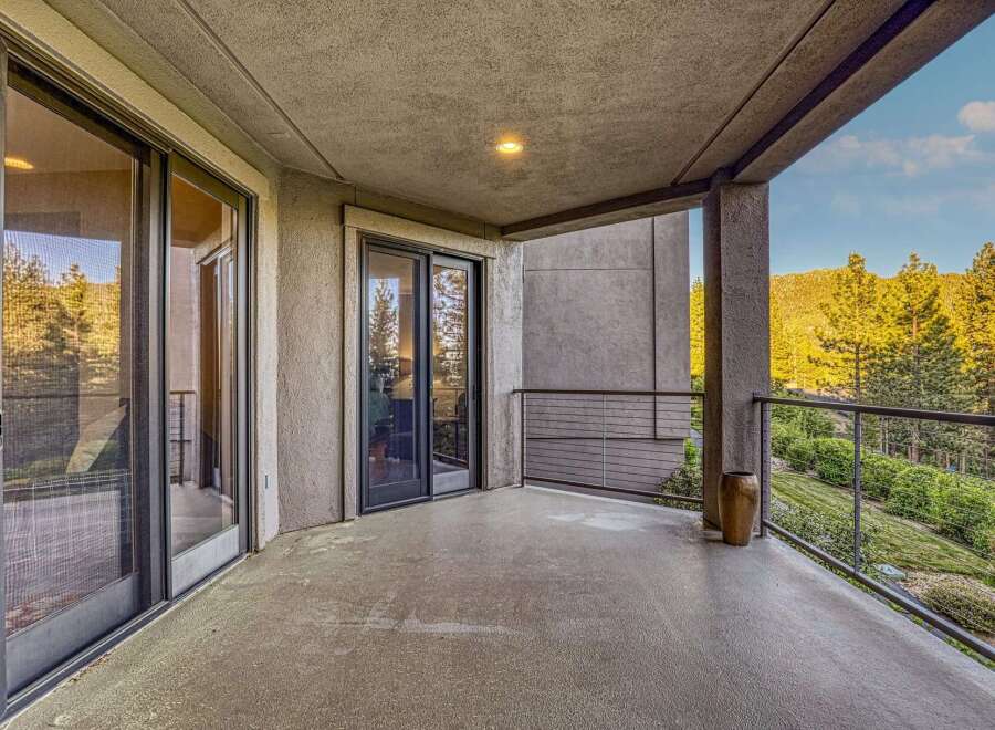 Enjoy breathtaking mountain views from this expansive balcony, perfect for outdoor living and entertaining.