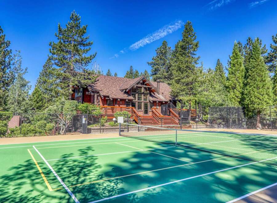 Enjoy outdoor recreation with a private tennis court, perfect for a friendly match or practice.