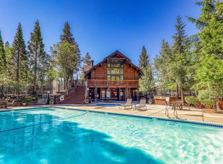 Enjoy a refreshing dip in this stunning swimming pool, perfect for hot summer days.