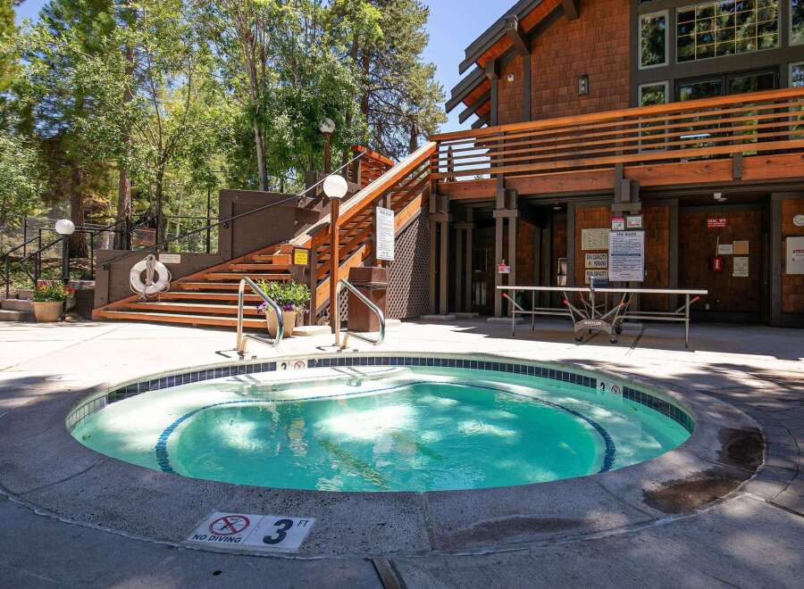 Enjoy a relaxing soak in this inviting spa, perfect for unwinding after a day of activities.