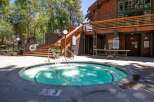 Enjoy a relaxing soak in this inviting spa, perfect for unwinding after a day of activities.