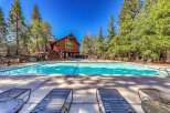 Enjoy a refreshing dip in this stunning swimming pool, perfect for a sunny day.