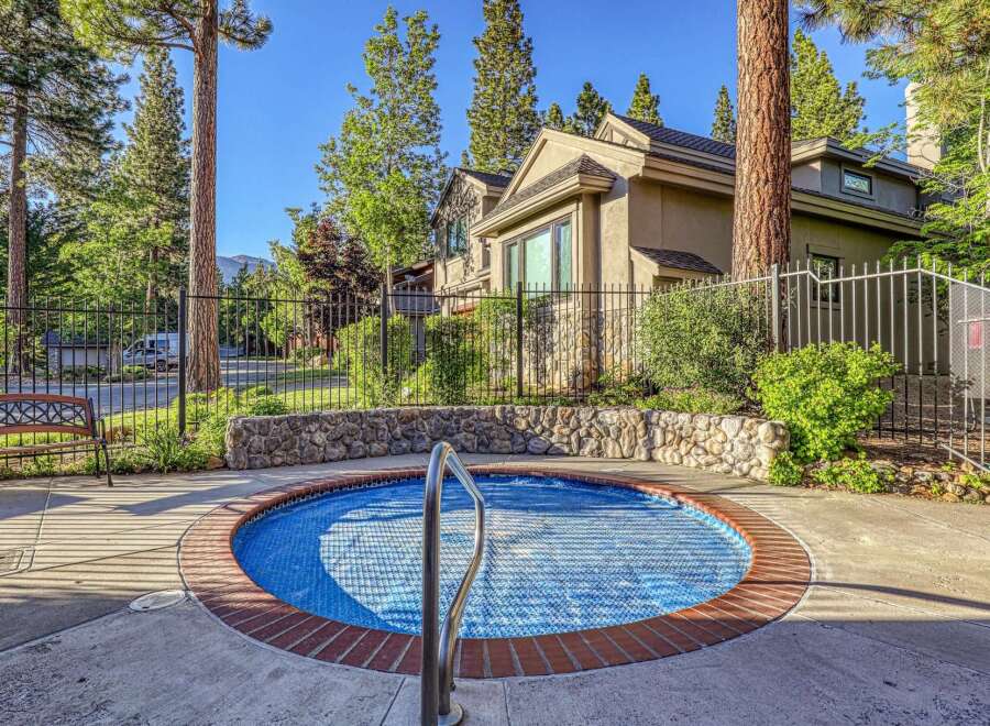 Enjoy relaxation and recreation in this inviting outdoor space, featuring a sparkling hot tub perfect for unwinding.