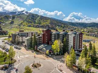 Experience mountain living at its finest in this stunning property, perfectly situated at the base of a ski resort.