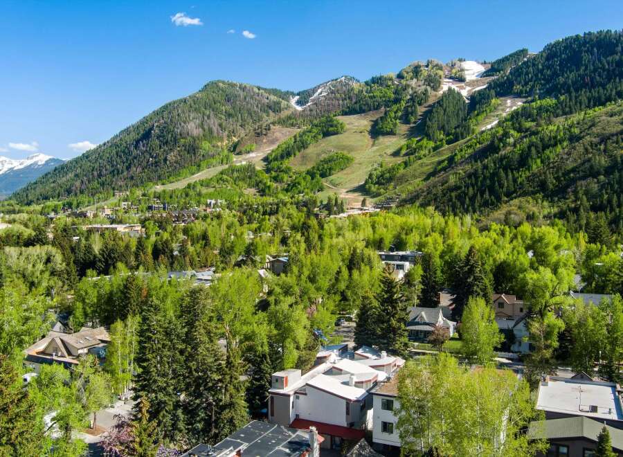 Experience the breathtaking beauty of this mountain town, nestled amidst lush green forests and towering peaks.