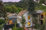 Nestled against a backdrop of majestic mountains, this charming property offers a serene escape.
