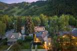 Nestled against a backdrop of majestic mountains and lush forests, this property offers a serene escape.