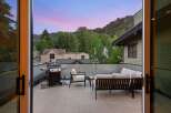 Enjoy breathtaking mountain views from this stunning rooftop patio, perfect for entertaining or relaxing.