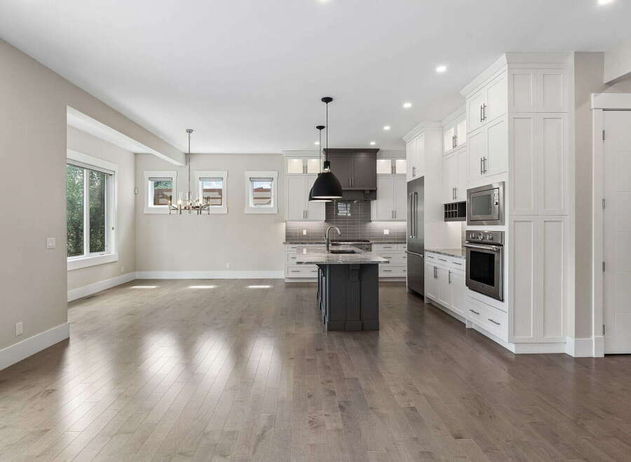 Experience modern living in this stunning open-concept kitchen and dining area.