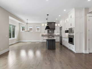 Experience modern living in this stunning open-concept kitchen and dining area.